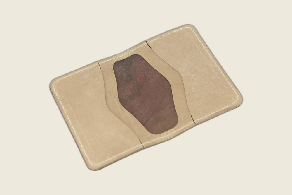 Warden bifold interior with natural Cypress horsehide card pockets and shell cordovan stamp in the well