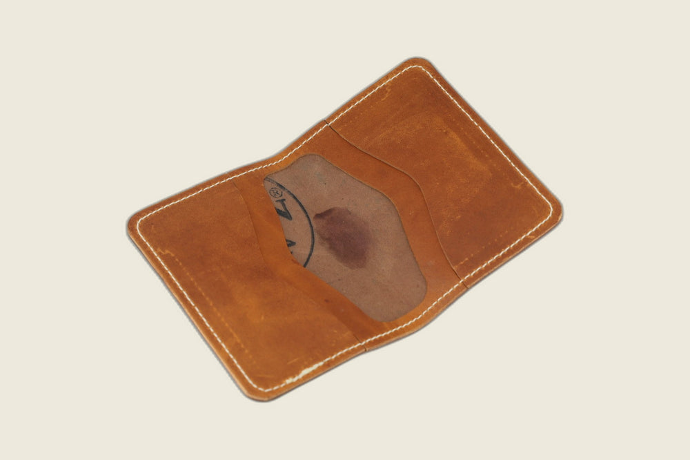 Warden bifold interior in English tan Cypress horsehide, two card pockets with inked tannery stamp