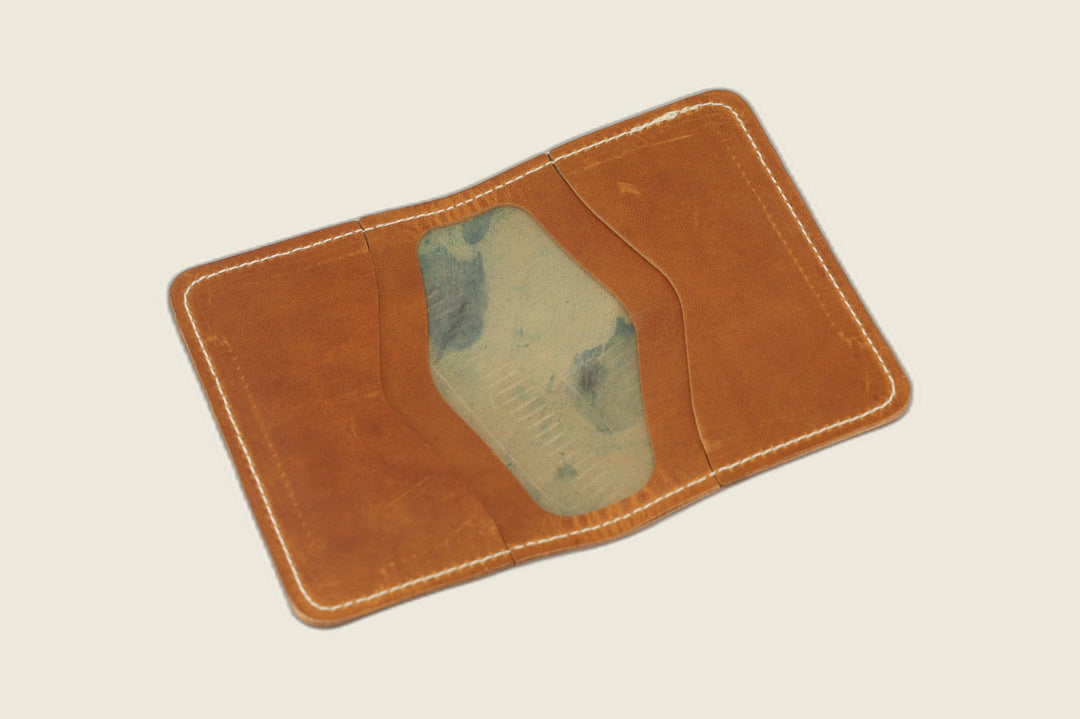 Warden bifold interior in English tan Cypress horsehide, card pockets with blue-green tannery stamp