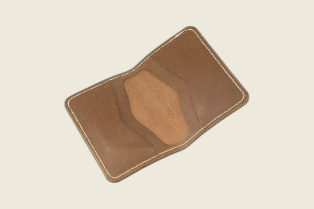 Warden bifold interior with natural Chromexcel horsehide card pockets and smooth tan well