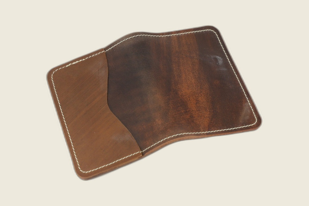 Warden bifold wallet in multicolor Rocado shell cordovan, two-tone brown exterior with slip pocket