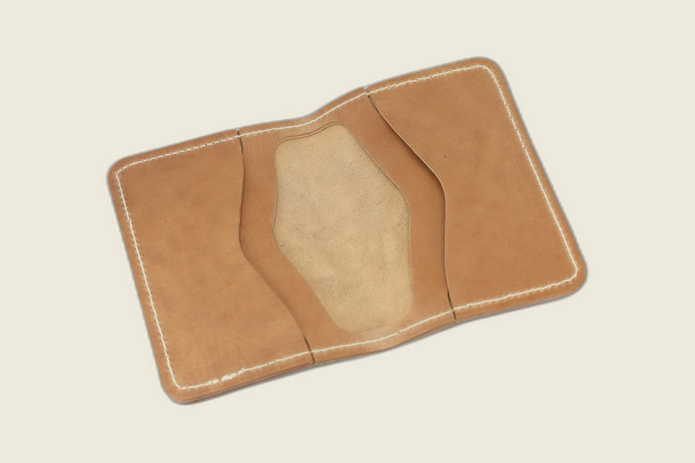 Warden bifold interior with natural Cloe shell card pockets and soft suede well