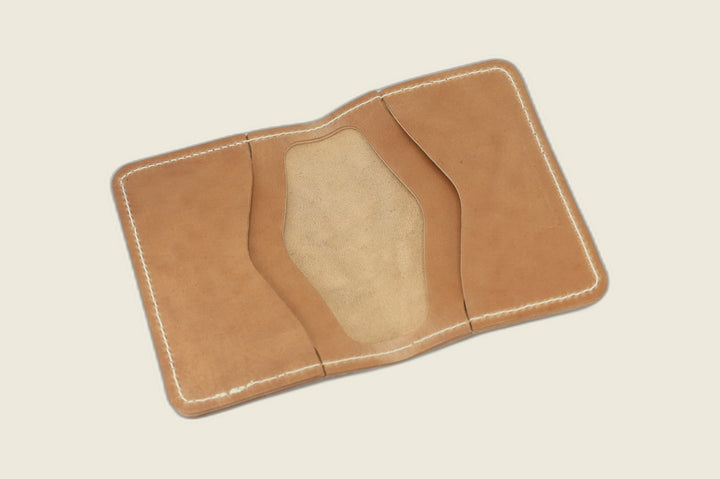 Warden bifold interior with natural Cloe shell card pockets and soft suede well