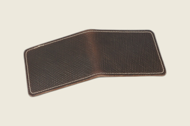 Stronghold bifold wallet in dark brown Russian grain shell cordovan, open flat showing hatch-grain exterior