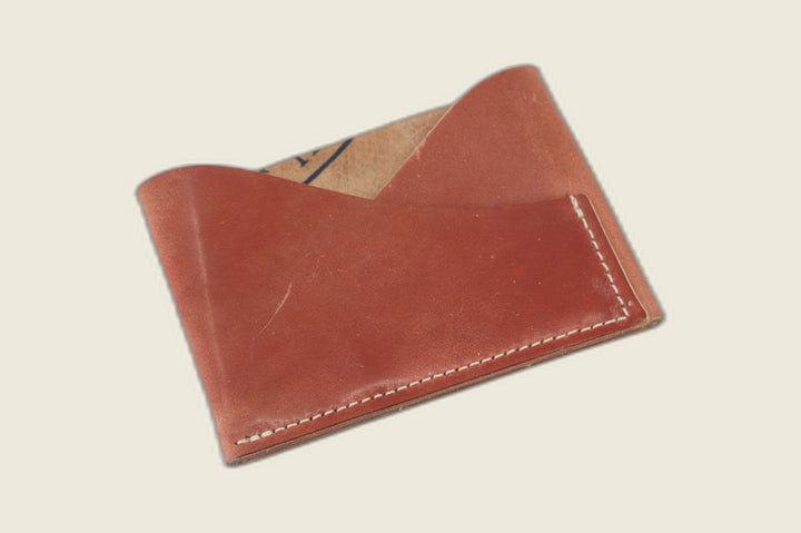 Sentinel front pocket wallet in marbled light brown Rocado shell cordovan with crossed pockets and cream stitching