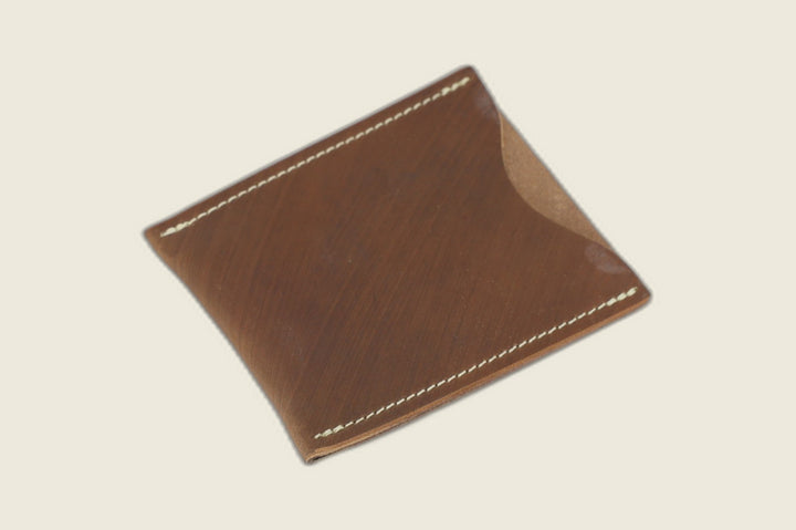 Safeguard sleeve front in light brown shell cordovan with soft brushed sheen, cream stitching and thumb scoop