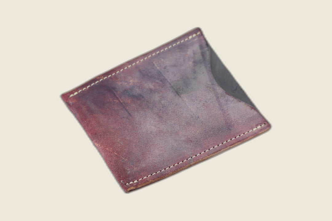 Safeguard sleeve front in marbled burgundy Rocado shell cordovan, smoky mottled finish with cream stitching