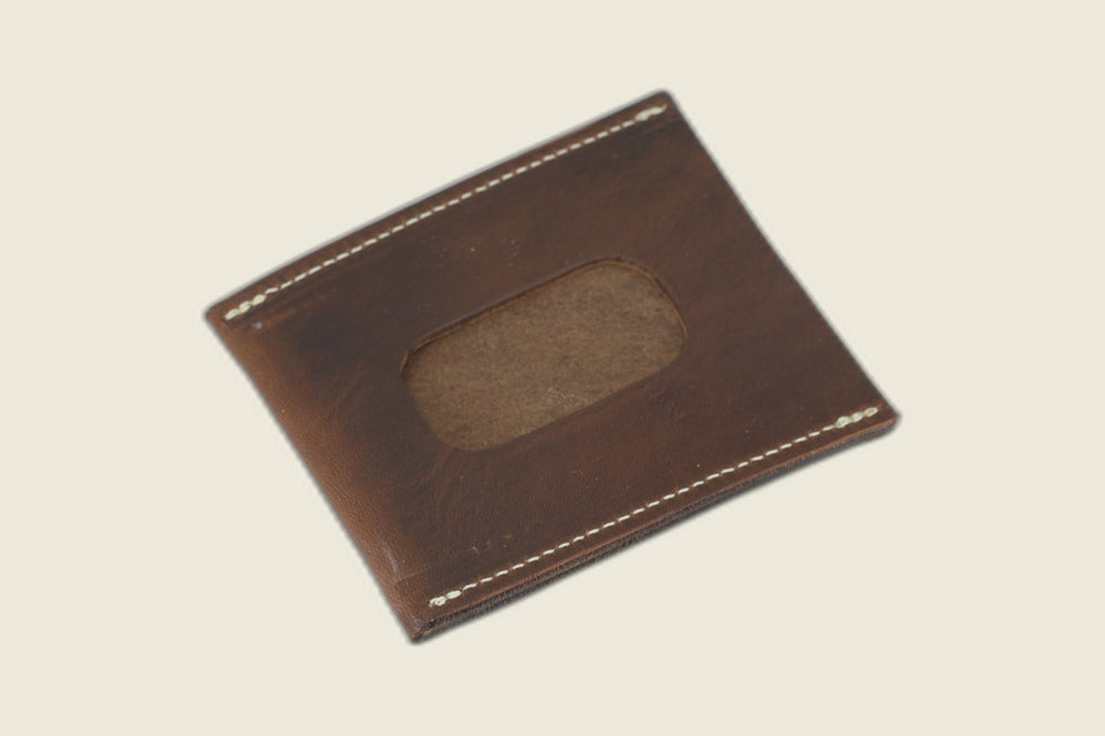 ID window side of the natural workshoe butt sleeve, rounded cutout showing tan suede beneath