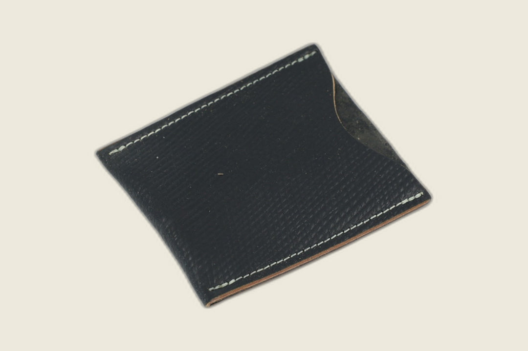 Safeguard sleeve front in black Russian grain shell cordovan, fine cross-hatch texture and cream stitching