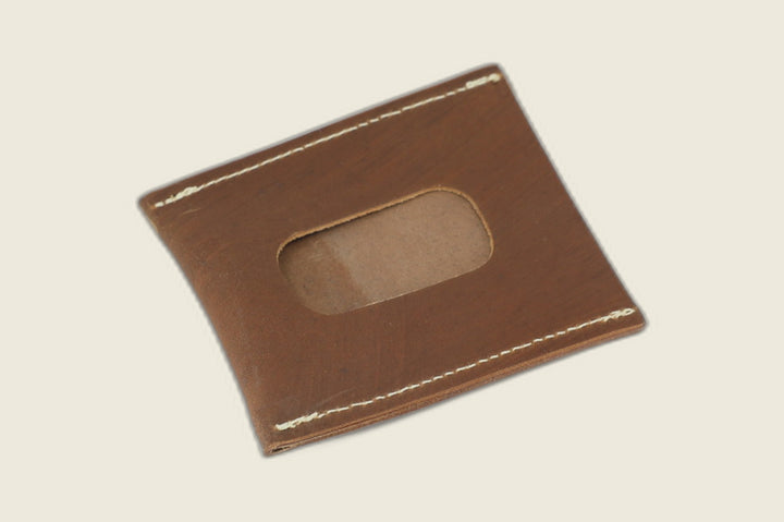 ID window side of the light brown shell cordovan Safeguard sleeve, rounded cutout revealing a suede backer