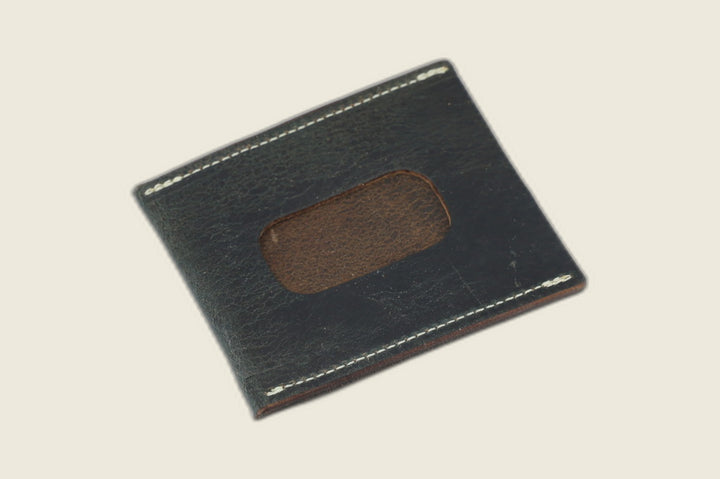 ID window side of the navy workshoe butt Safeguard sleeve, brown suede showing through the rounded cutout