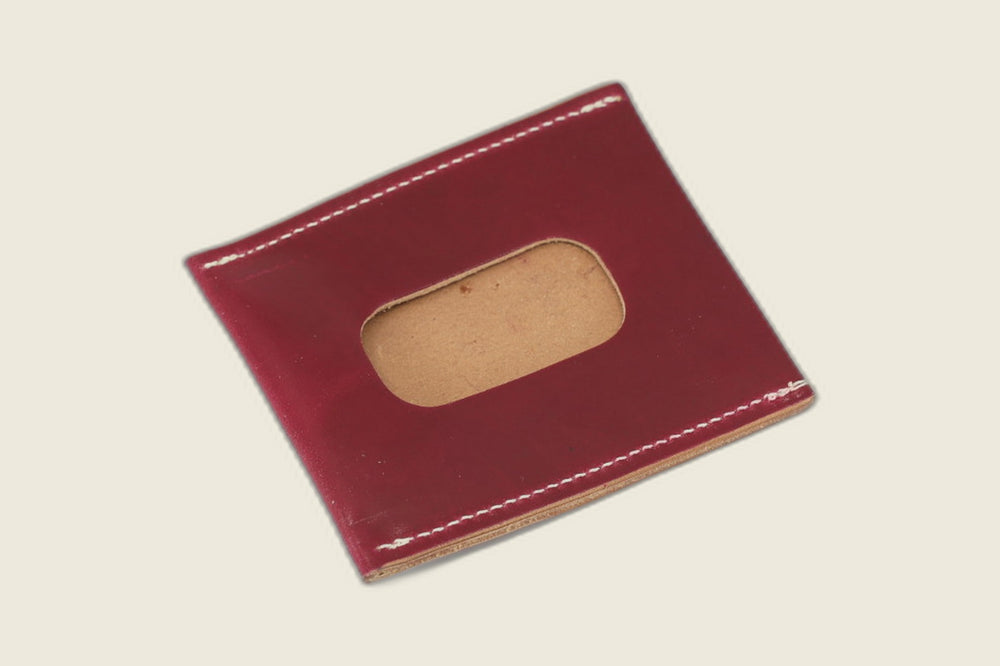 ID window side of the ultraviolet shell cordovan Safeguard sleeve, rounded cutout with natural suede backing