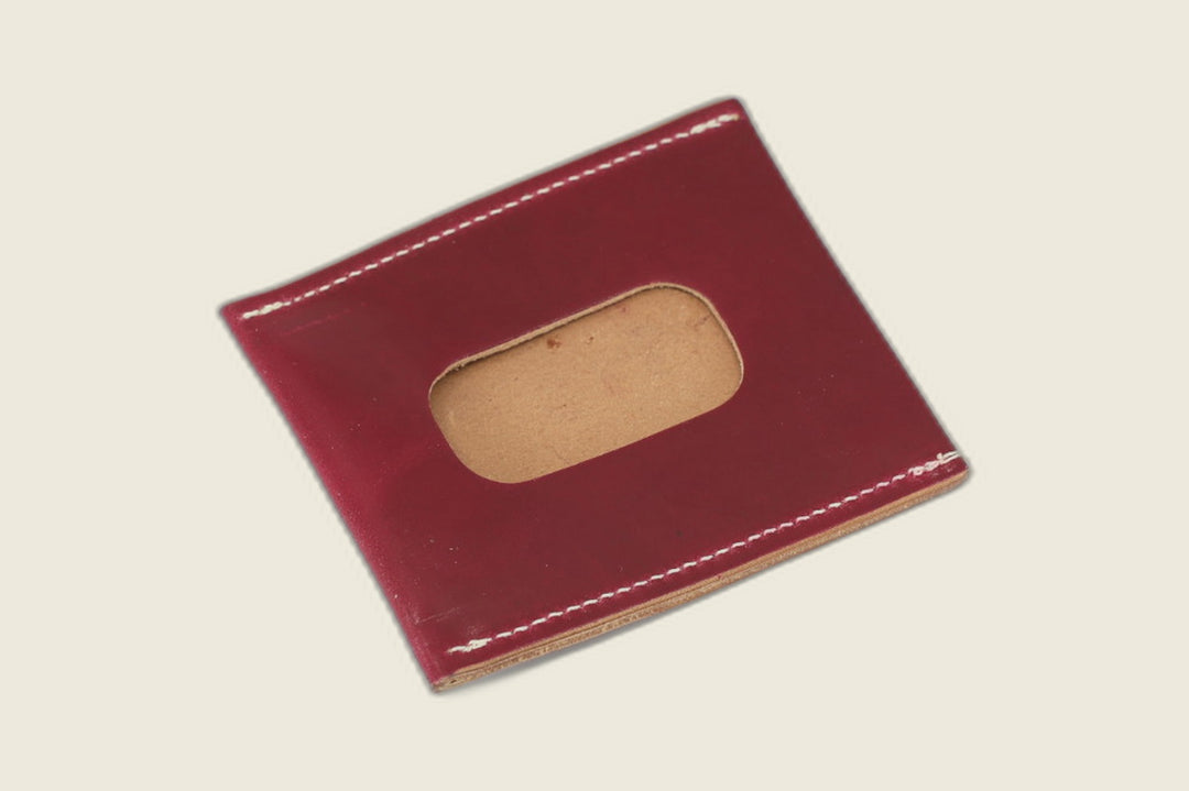 ID window side of the ultraviolet shell cordovan Safeguard sleeve, rounded cutout with natural suede backing
