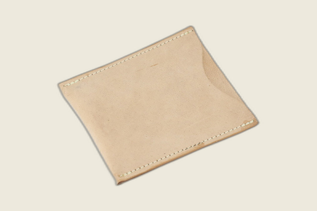 Safeguard sleeve front in pale unglazed natural Cloe shell cordovan, matte finish with tonal cream stitching