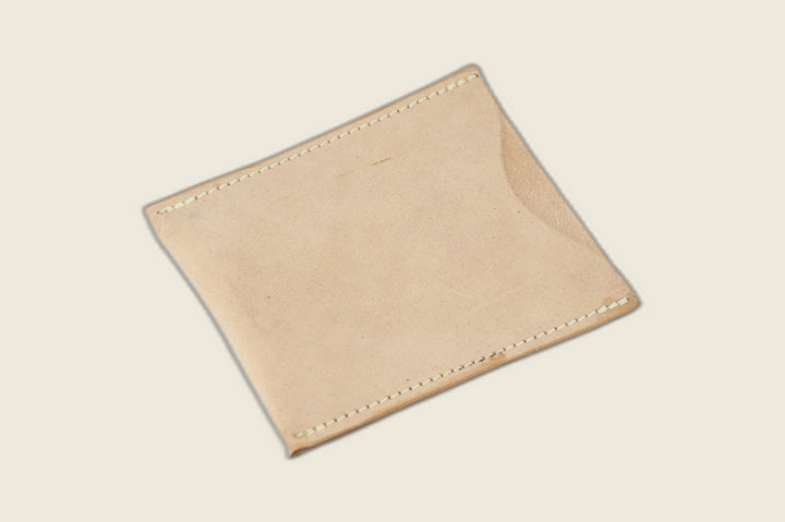 Safeguard sleeve front in pale unglazed natural Cloe shell cordovan, matte finish with tonal cream stitching