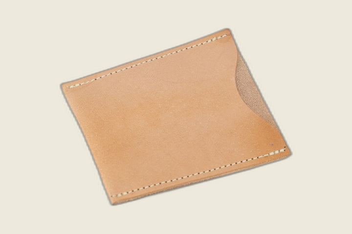 Safeguard sleeve front in pale natural veg tan Hermann Oak steerhide with cream stitching and thumb scoop