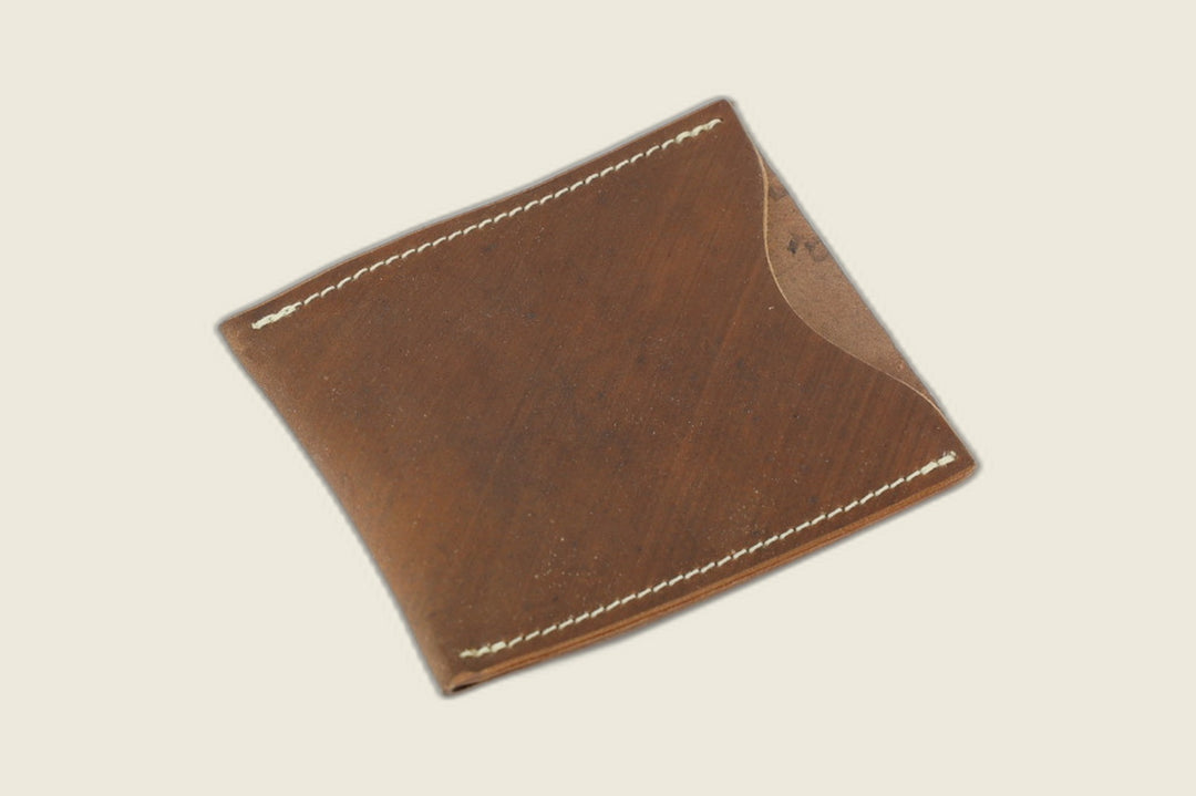 Safeguard sleeve front in light brown shell cordovan, warm russet grain with cream stitching and curved thumb scoop