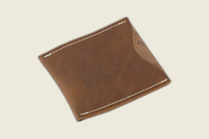 Safeguard sleeve front in light brown shell cordovan, warm russet grain with cream stitching and curved thumb scoop