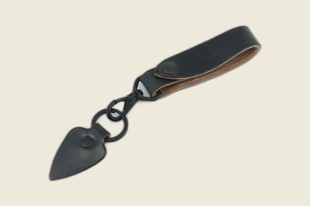 Lanyard in black J&FJ harness leather with black snap, swivel clasp, key ring and arrowhead leather fob
