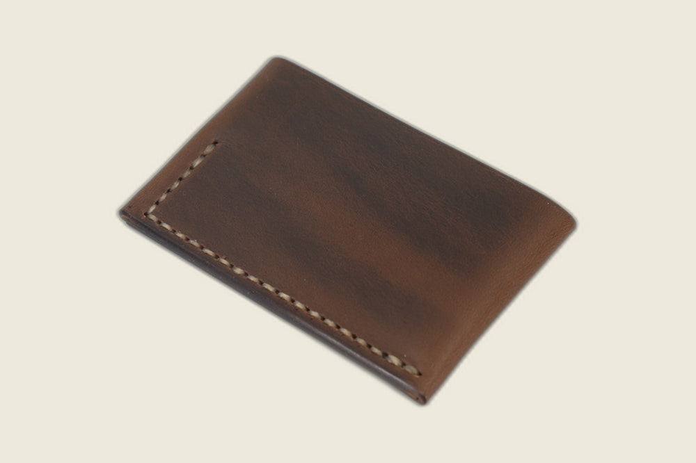 Back of the Sentinel Horween natural horsebutt sleeve, smooth burnished panel with contrast stitching at the corner